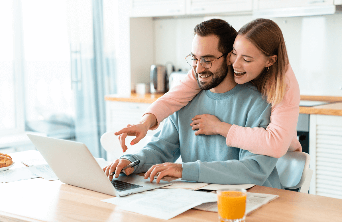 A happy couple who just received their installment loan in Manitoba